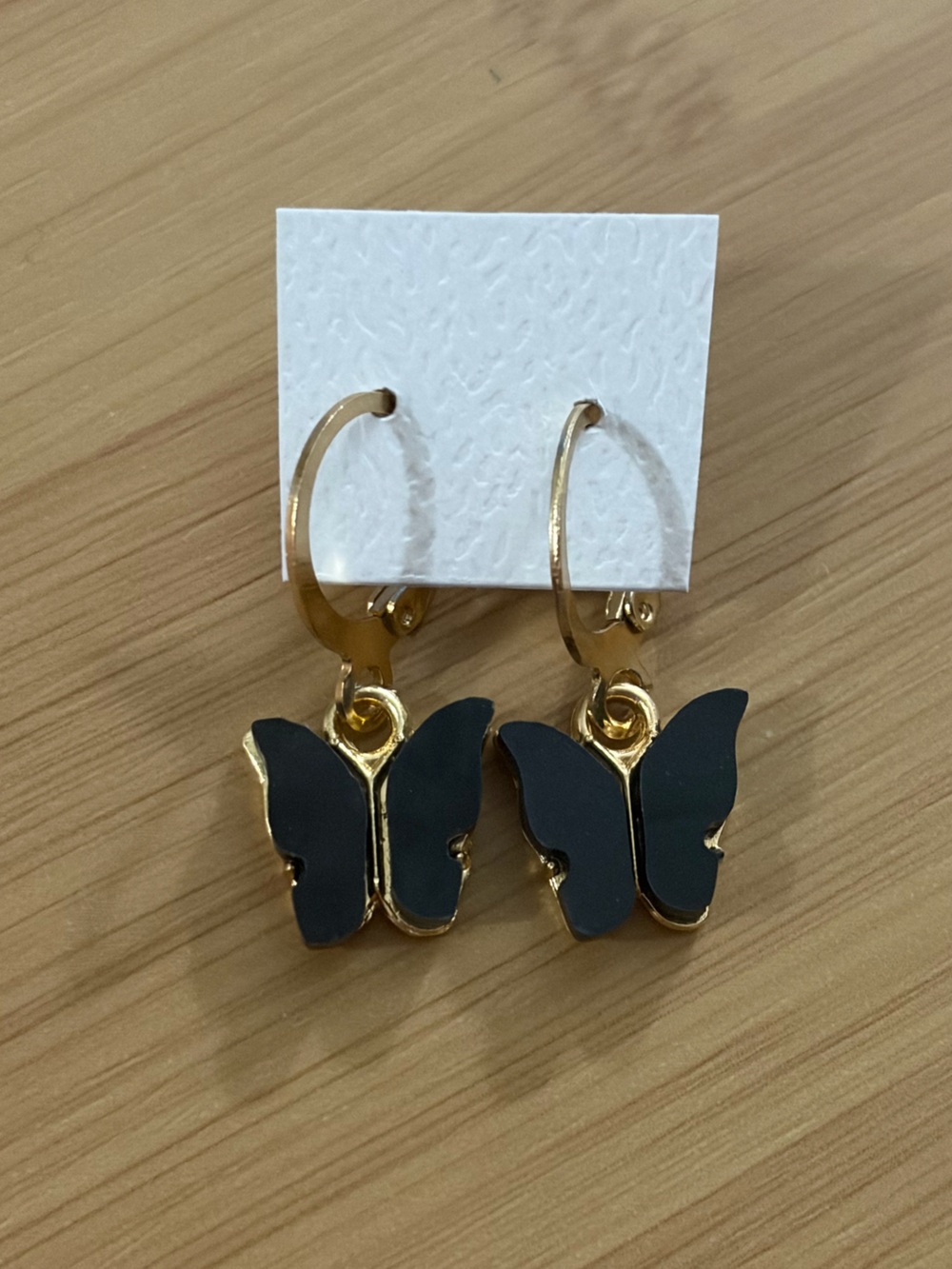 Gold Hoop Earrings with Black Butterfly Charms